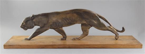 A French Art Deco bronze model of a prowling panther, width 27.5in.